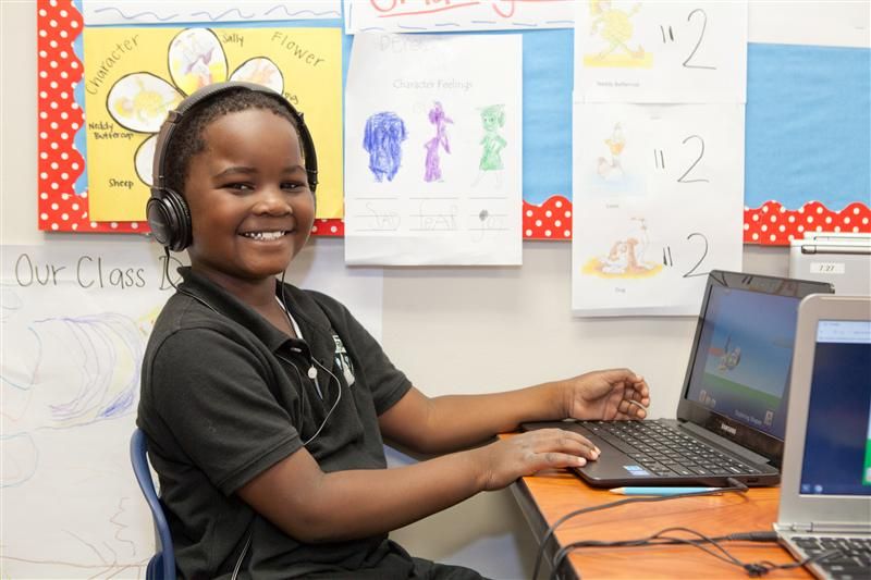 Uplift Pinnacle scholar on computer